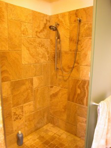 Tiled double shower in master bathroom.